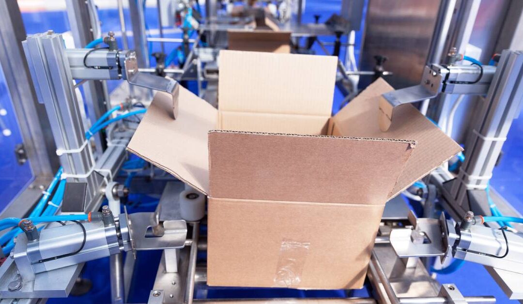 A high-tech automatic cardboard packaging machine, designed for efficiently assembling and sealing cardboard boxes.